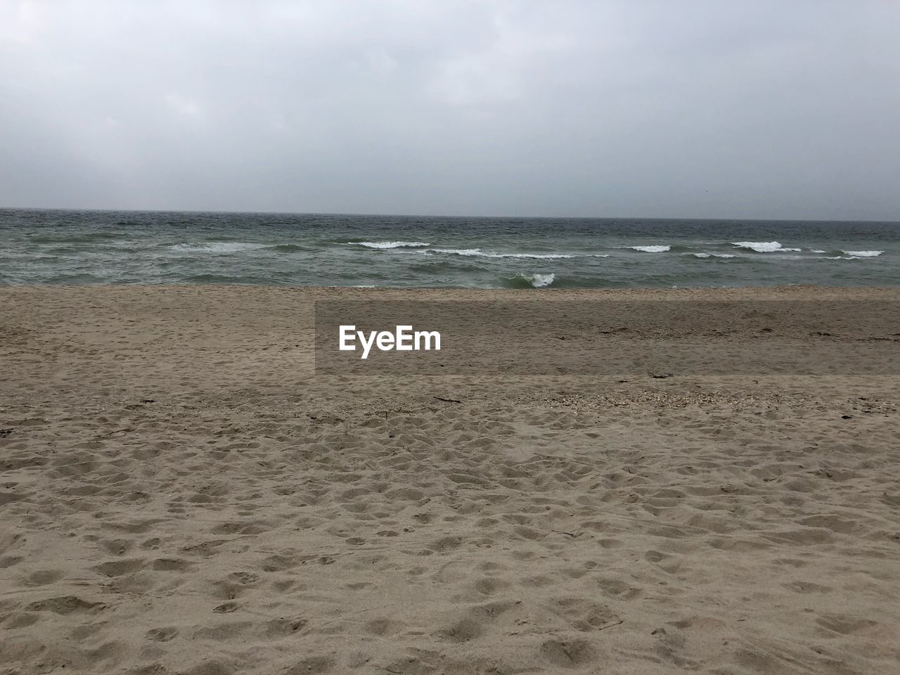 VIEW OF BEACH AGAINST SKY