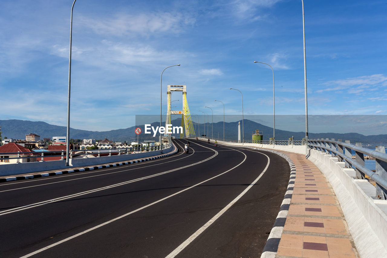 PANORAMIC VIEW OF ROAD AGAINST SKY