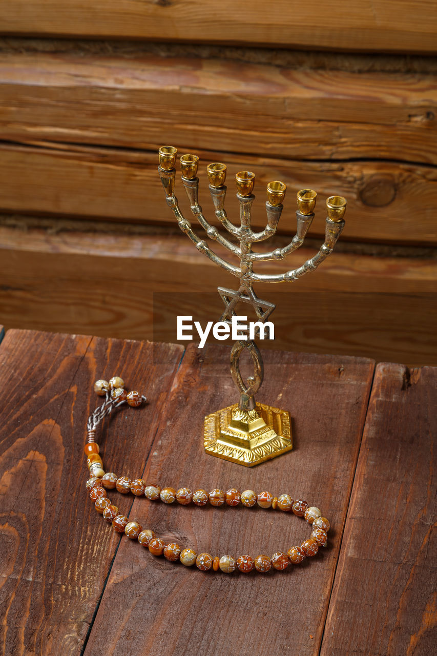 high angle view of pearl jewelry on table