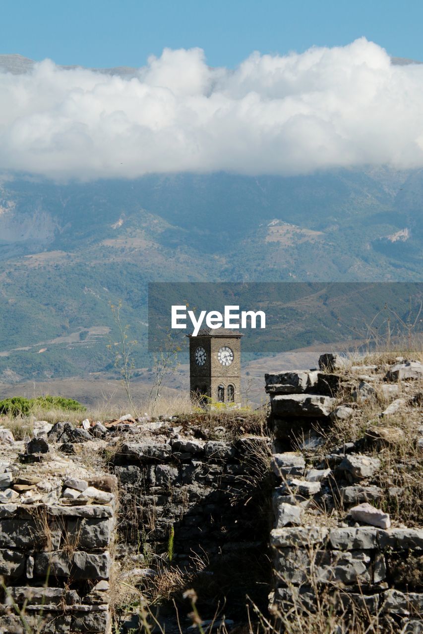 architecture, built structure, mountain, building exterior, sky, nature, building, environment, cloud, landscape, mountain range, no people, scenics - nature, history, ruins, day, the past, land, outdoors, rural area, sea, travel destinations, rock, travel, house, beauty in nature, plant