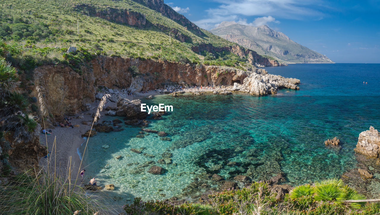 SCENIC VIEW OF SEA AND ROCKS