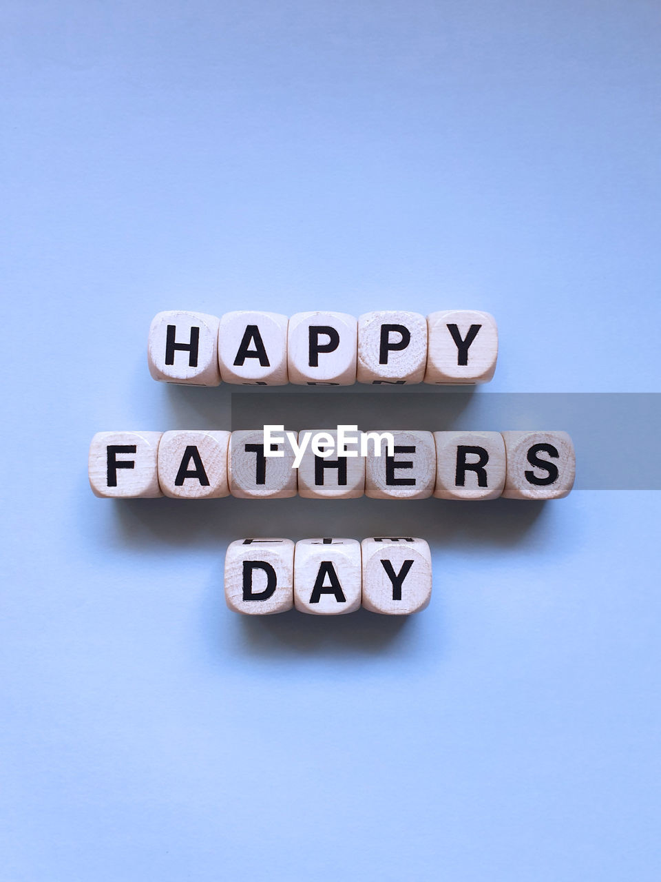 Happy fathers day, text against  blue background