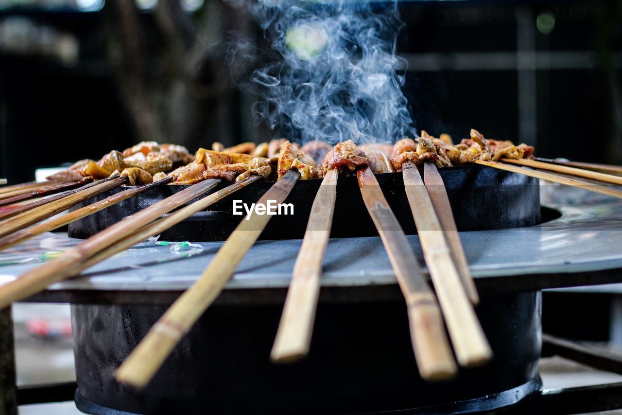 Close-up of food on barbecue grill