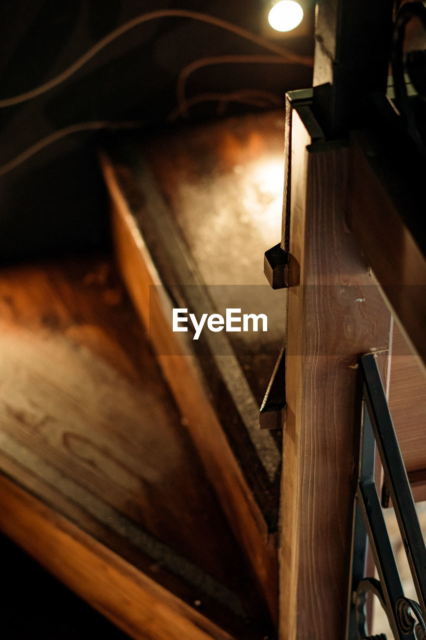 High angle view of illuminated staircase at home