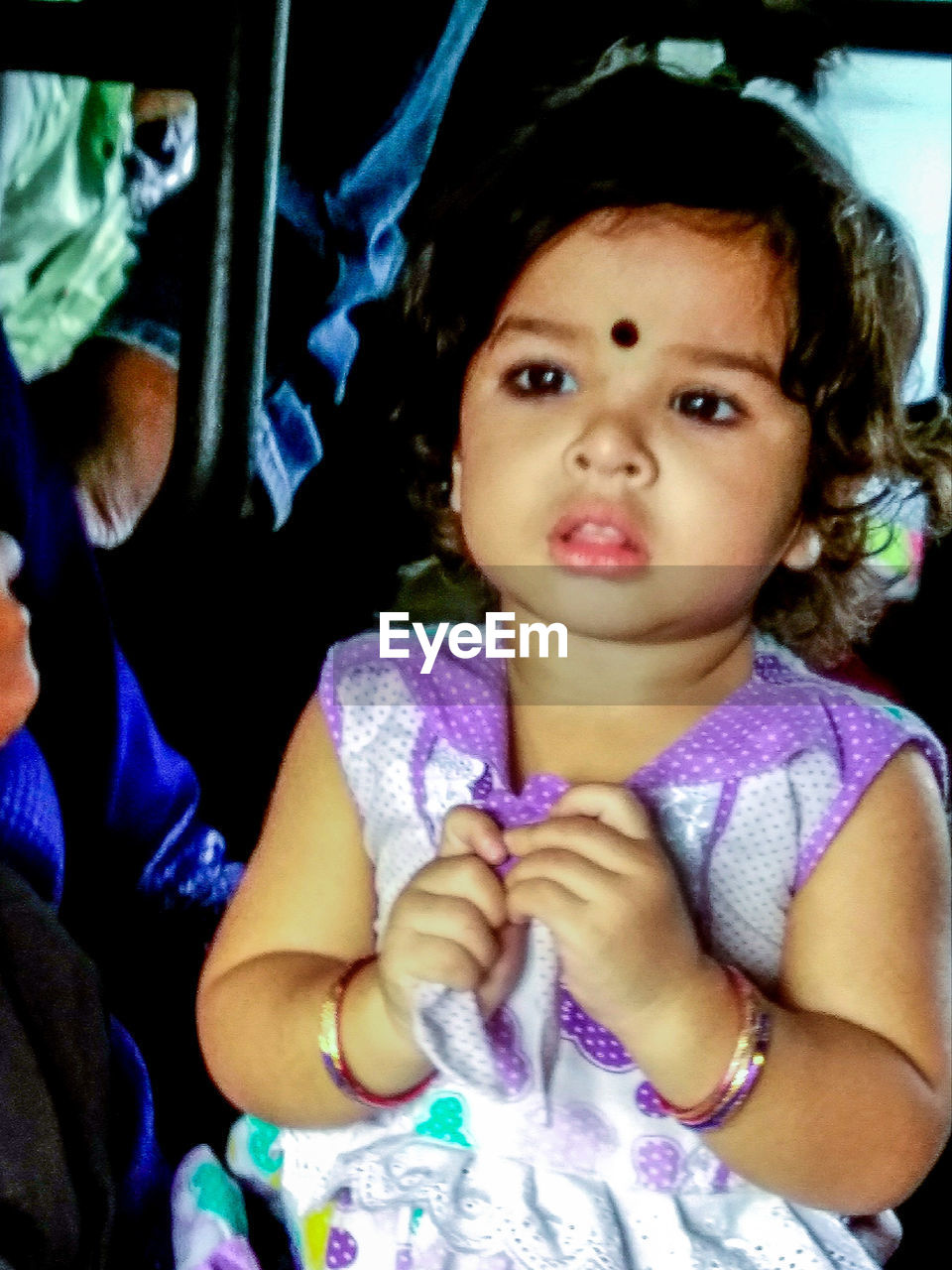 CLOSE-UP PORTRAIT OF CUTE GIRL WITH BABY