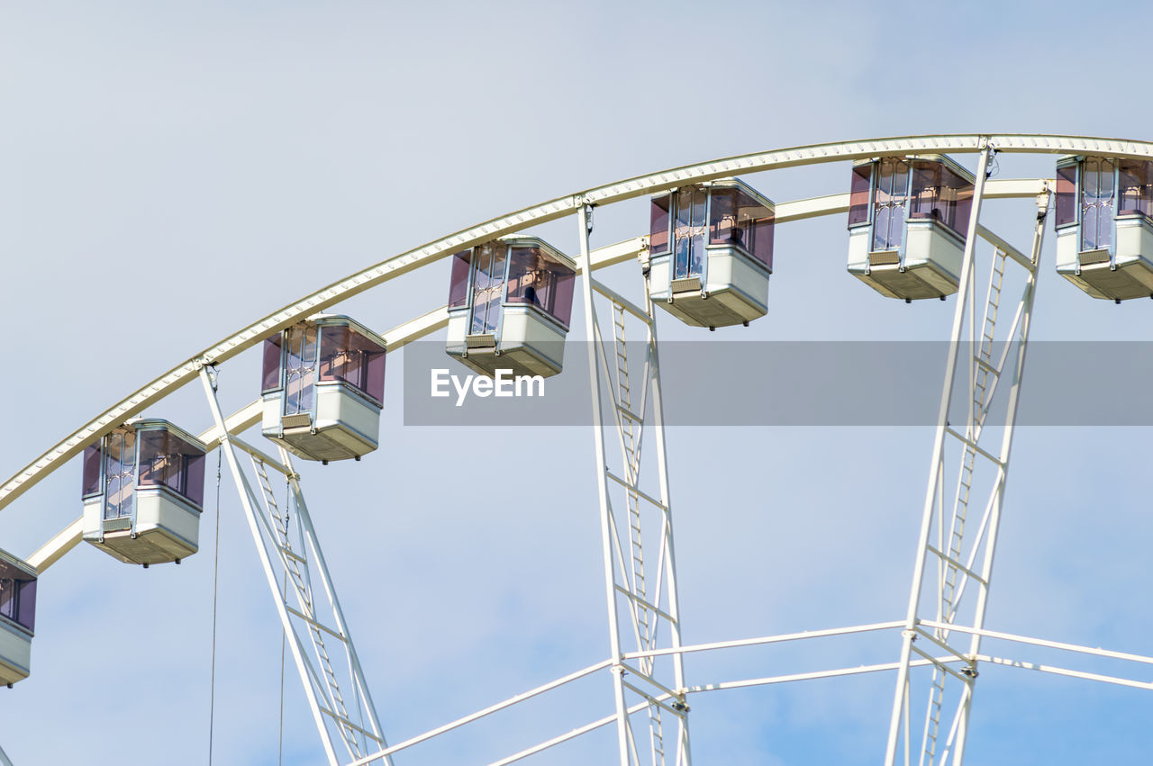 Detail of a giant ferris wheel against the sky