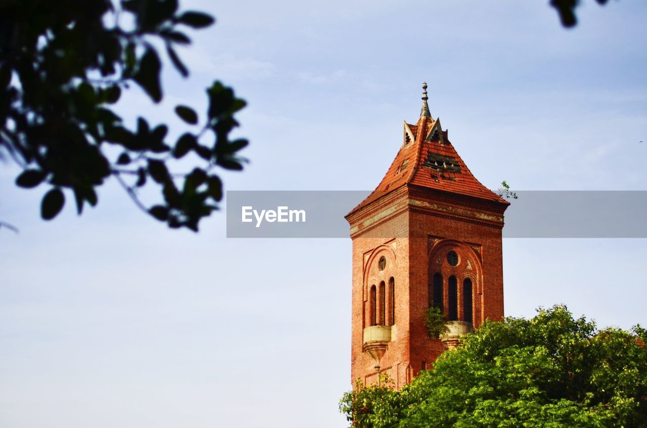 LOW ANGLE VIEW OF CLOCK TOWER