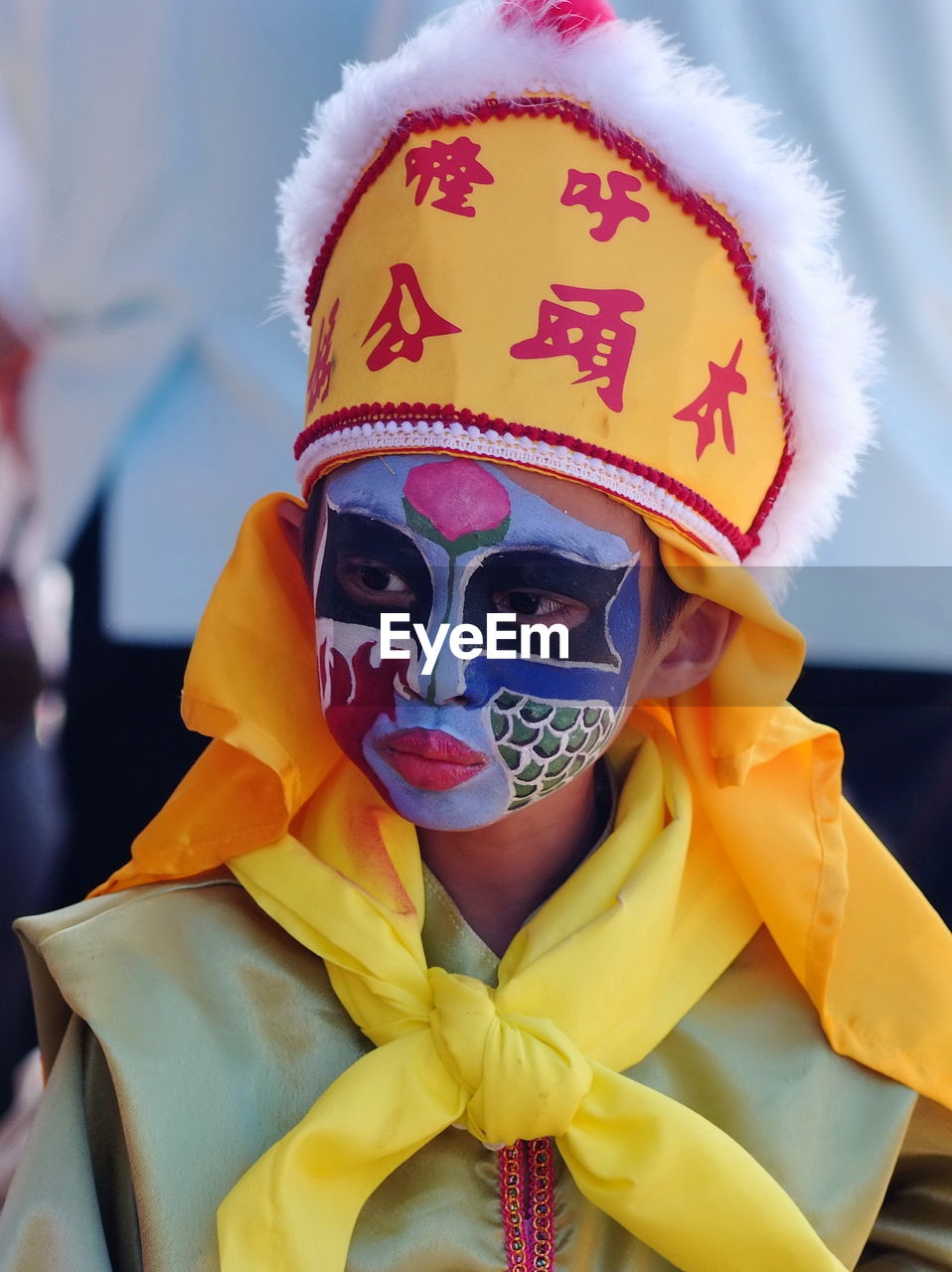 Close-up of boy wearing carnival costume