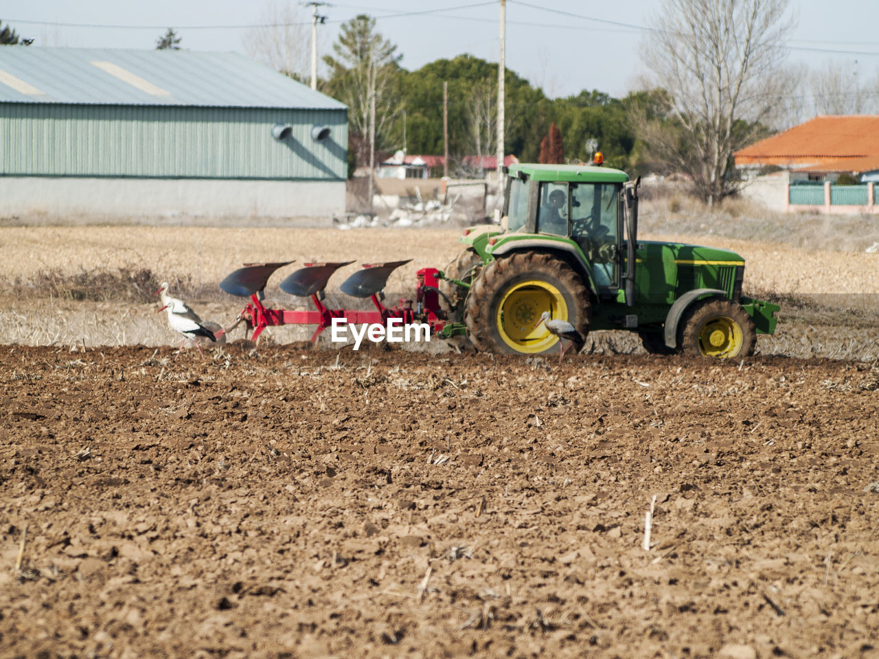 Combine harvester on field in farm