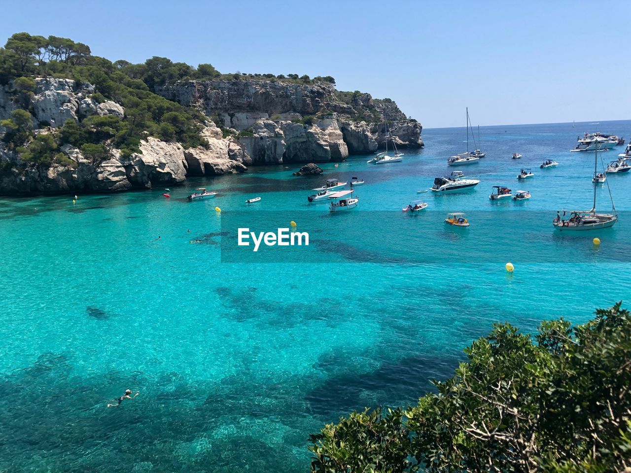 Scenic view of sea against clear sky