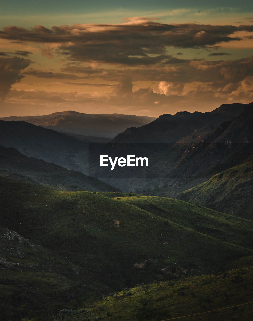 Scenic view of mountains against sky during sunset