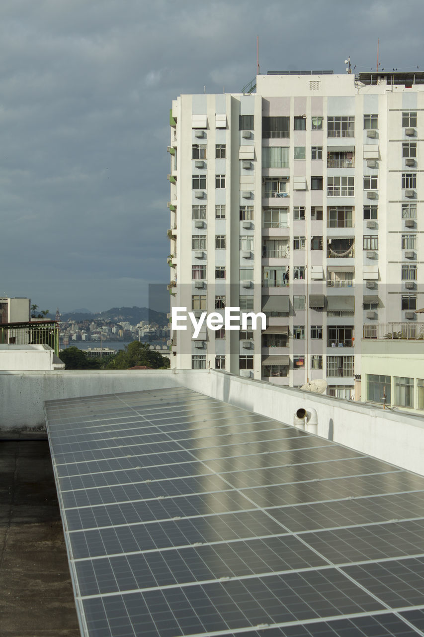 Solar panels installed on the terrace of a residential condominium