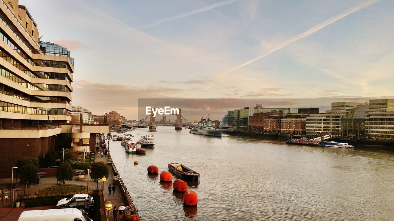 CITY BY RIVER AGAINST SKY