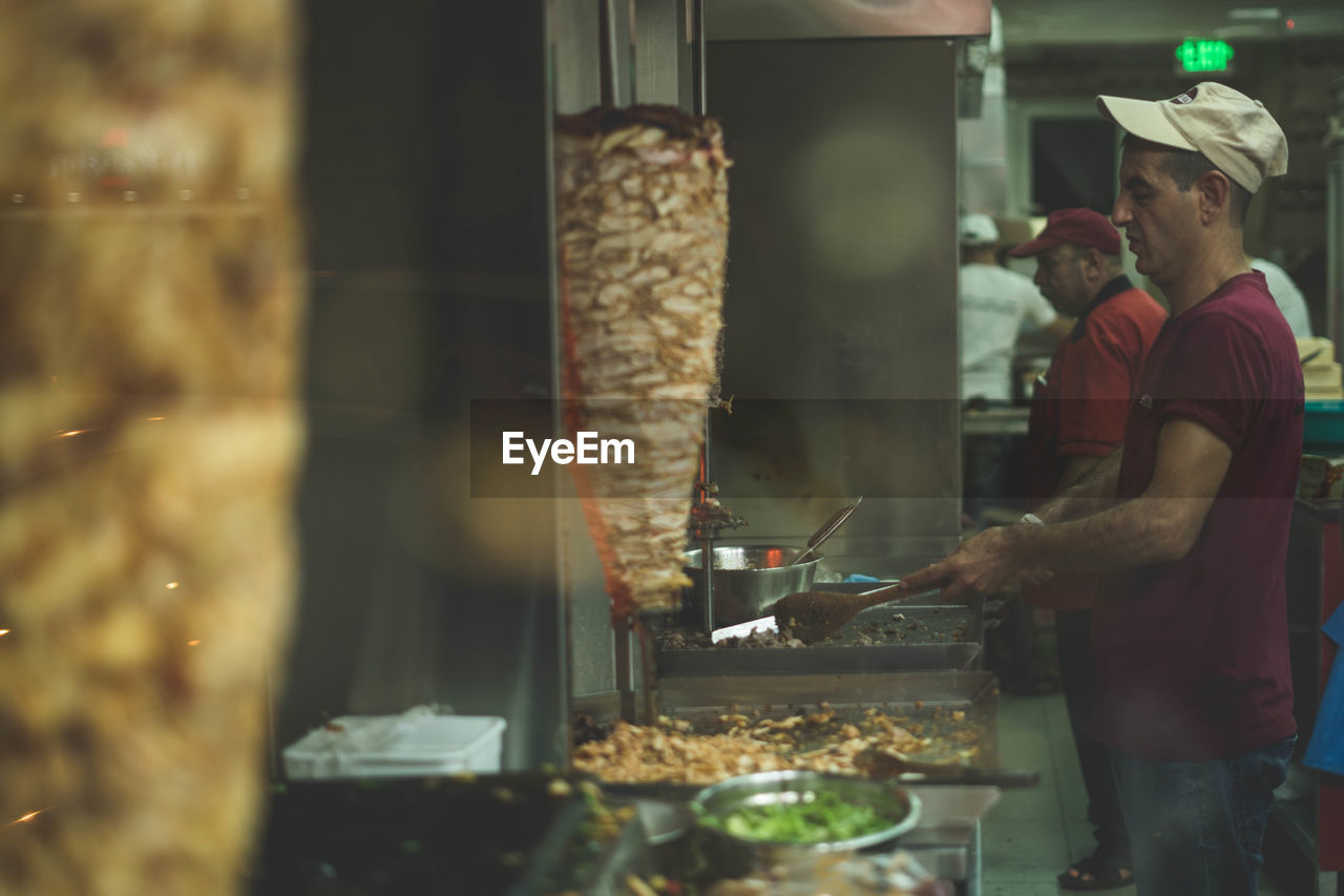 Man preparing food in restaurant