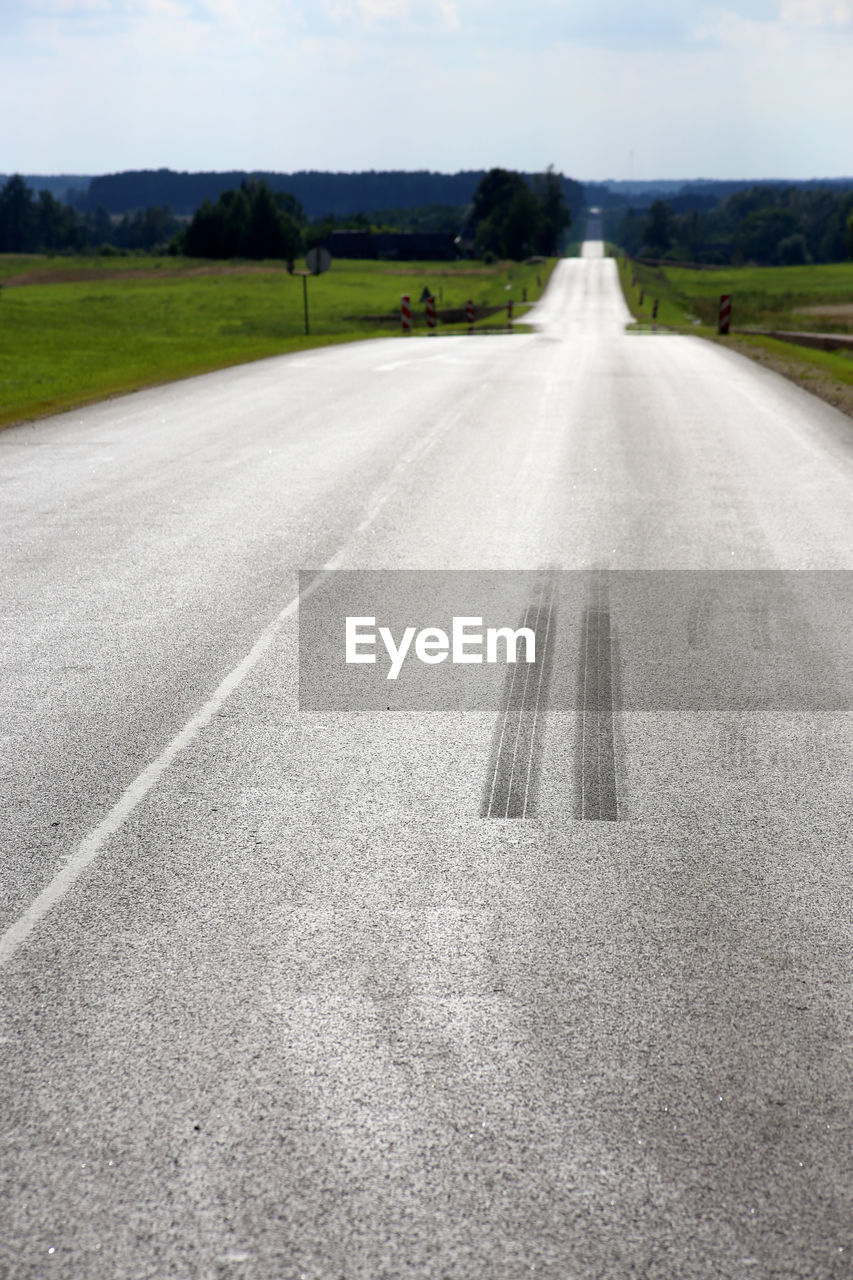 Road passing through field