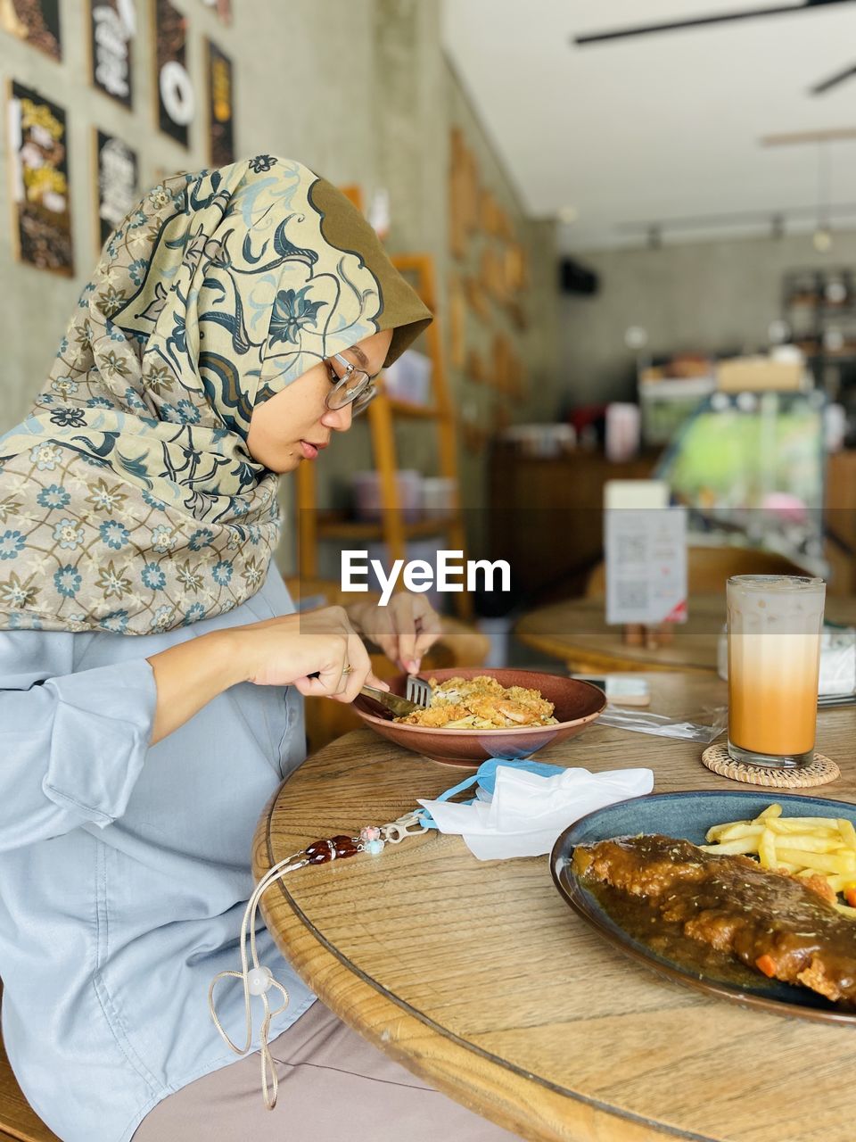 Midsection of woman having food