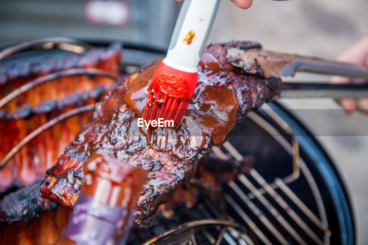 CLOSE-UP OF MEAT IN BARBECUE