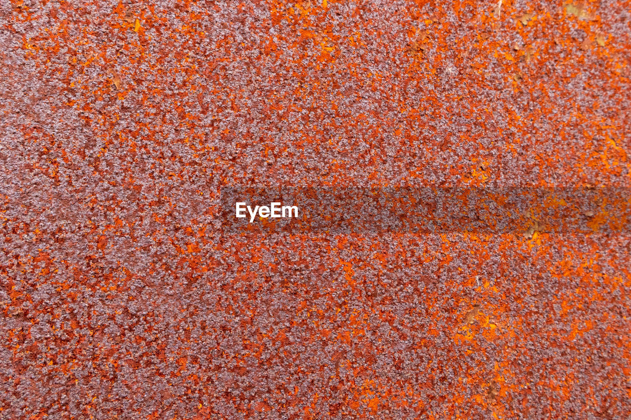 FULL FRAME SHOT OF ORANGE STAR SHAPE