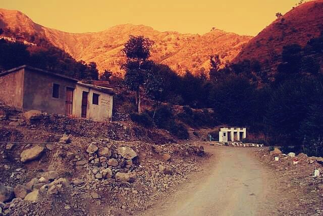 ROAD PASSING THROUGH MOUNTAIN