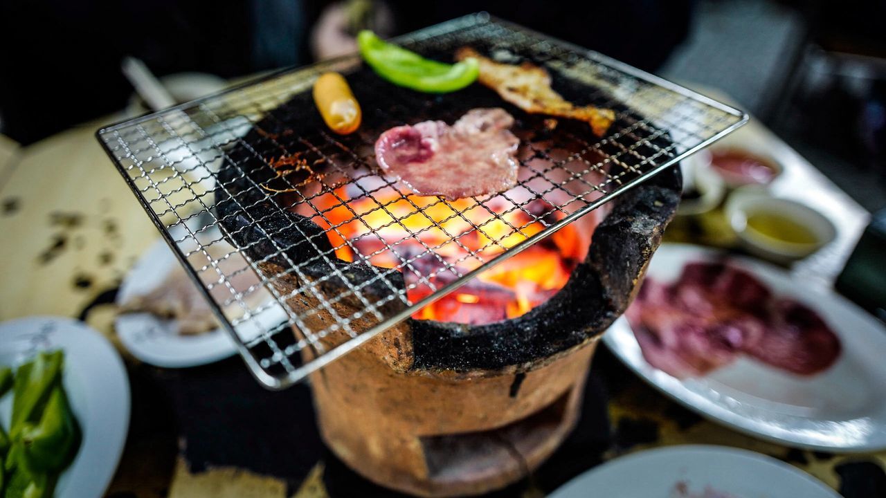 Meat on barbecue grill