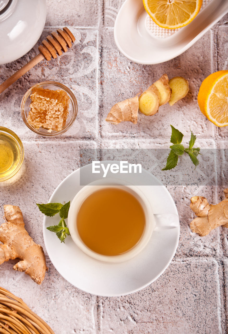 Refreshing ginger tea with lemon, mint leaf and honey