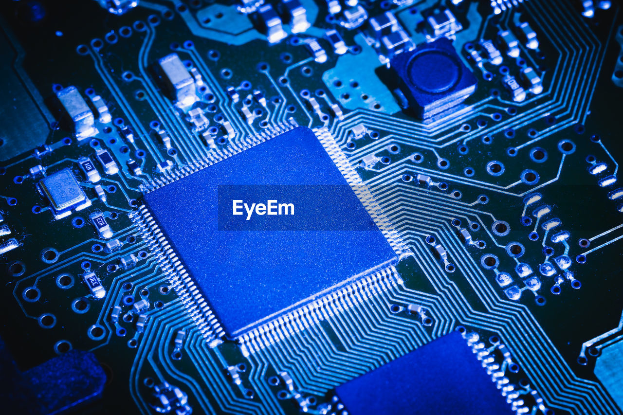 The microchip ai data mining concept of artificial intelligence on computer electronic board
