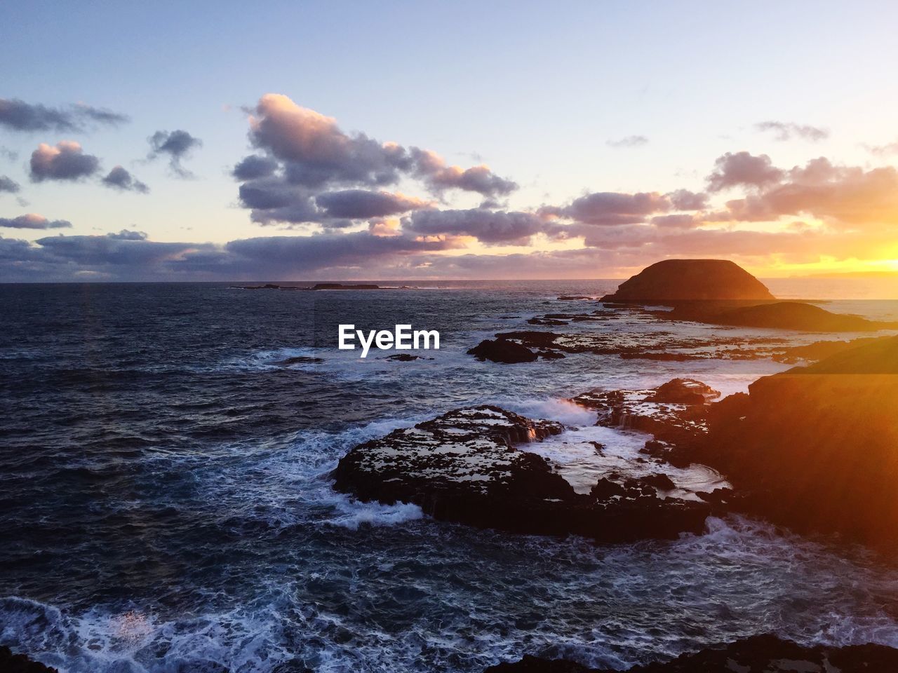 Scenic view of sea against sky during sunset