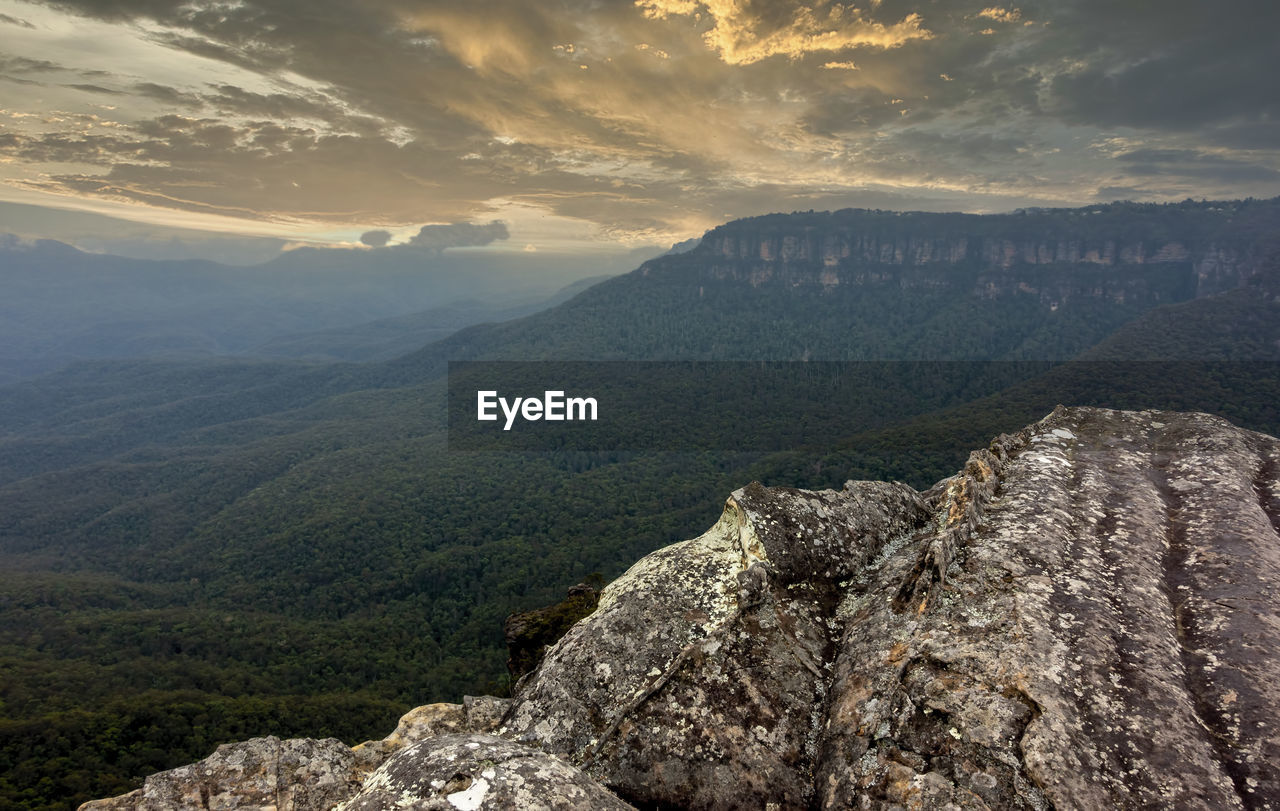 Scenic view of mountains against sky during sunset