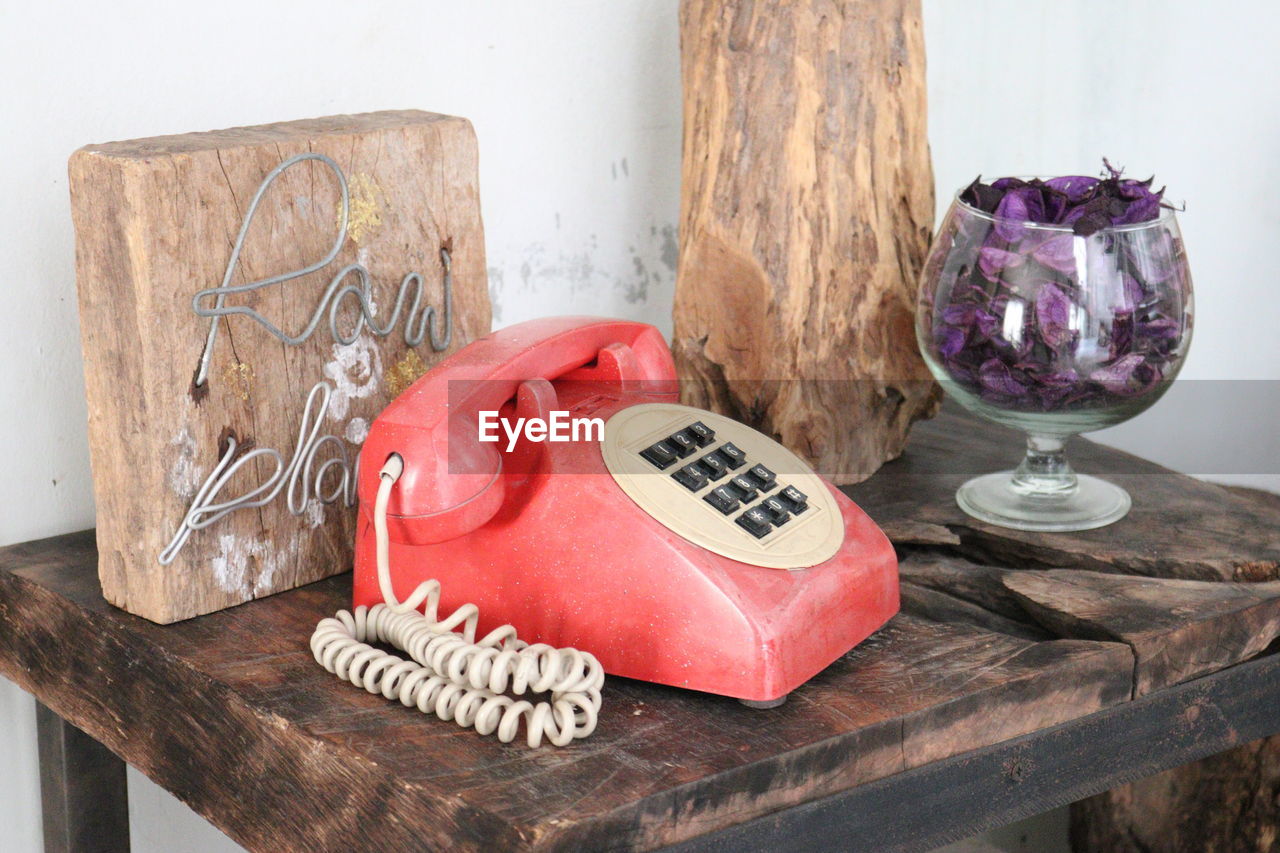 Close-up of telephone on table at home