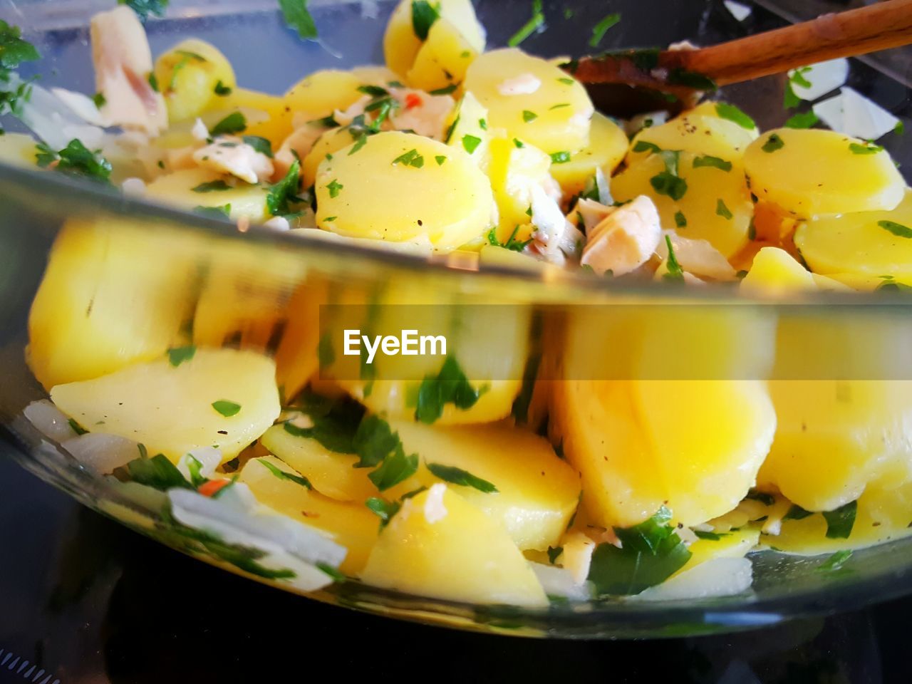 Close-up of potato salad in glass container