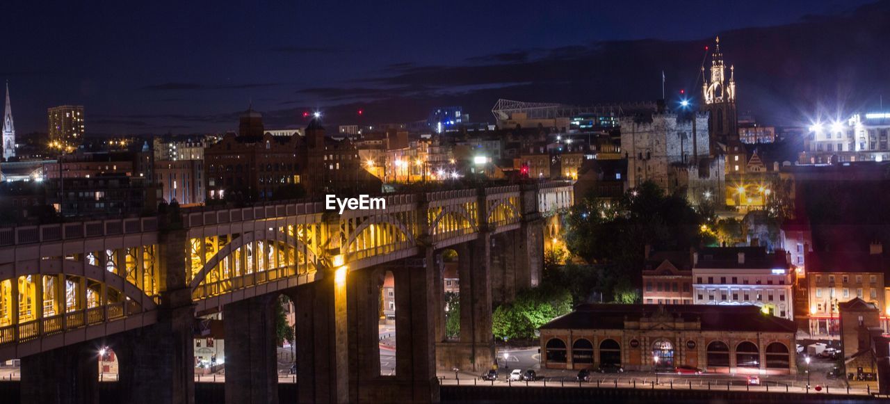 Illuminated cityscape at night