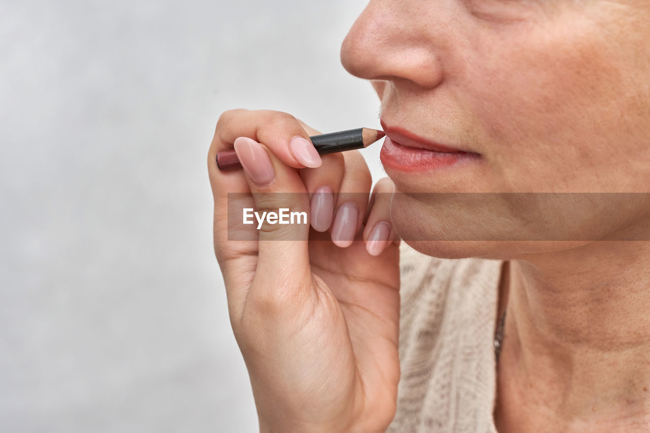 close-up of young woman smoking