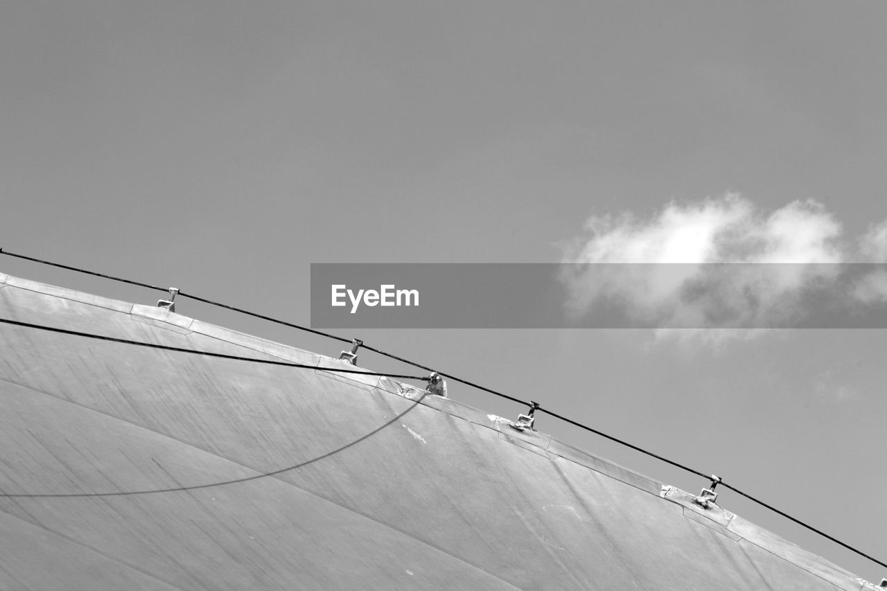 LOW ANGLE VIEW OF SNOW ON MOUNTAIN AGAINST SKY