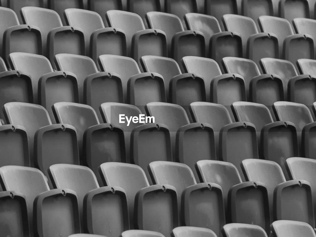 full frame shot of empty seats in stadium