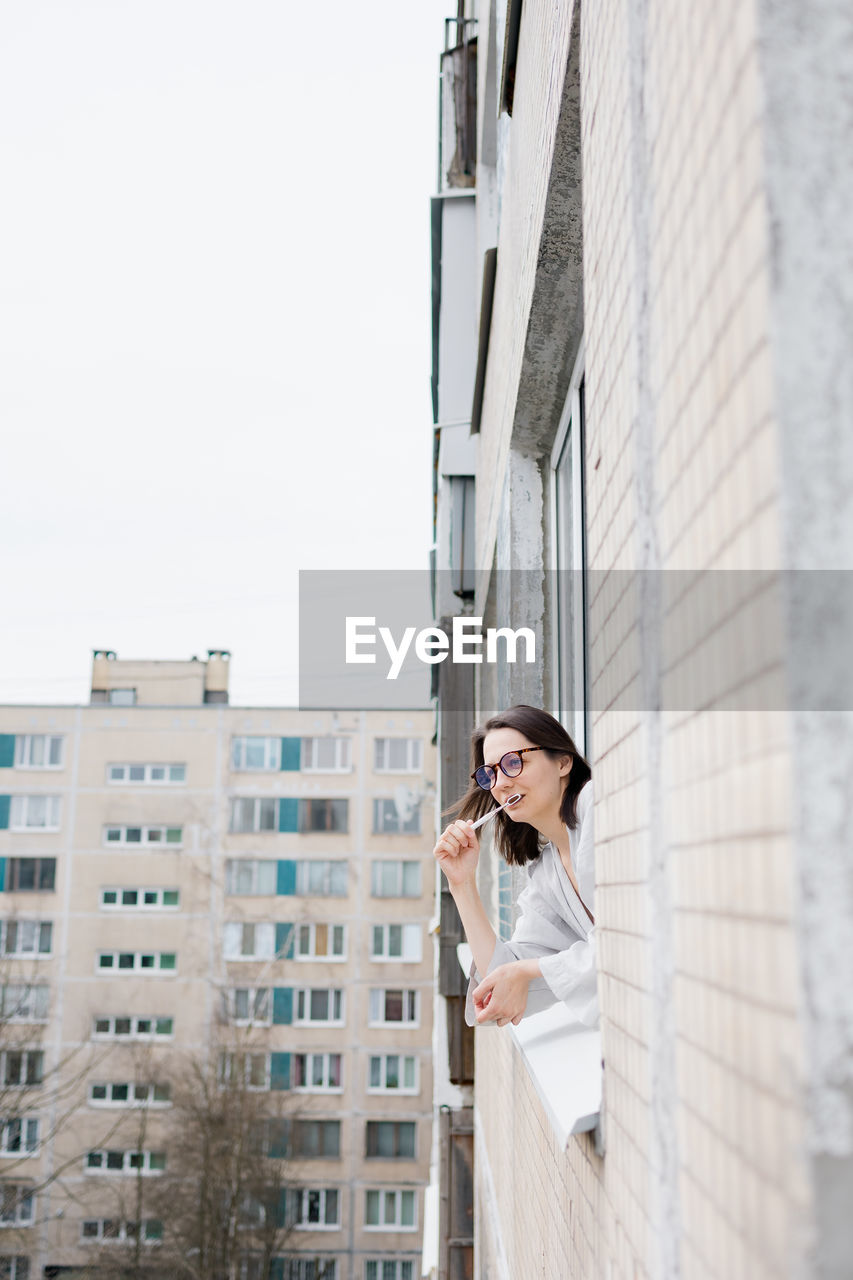 Young woman using mobile phone