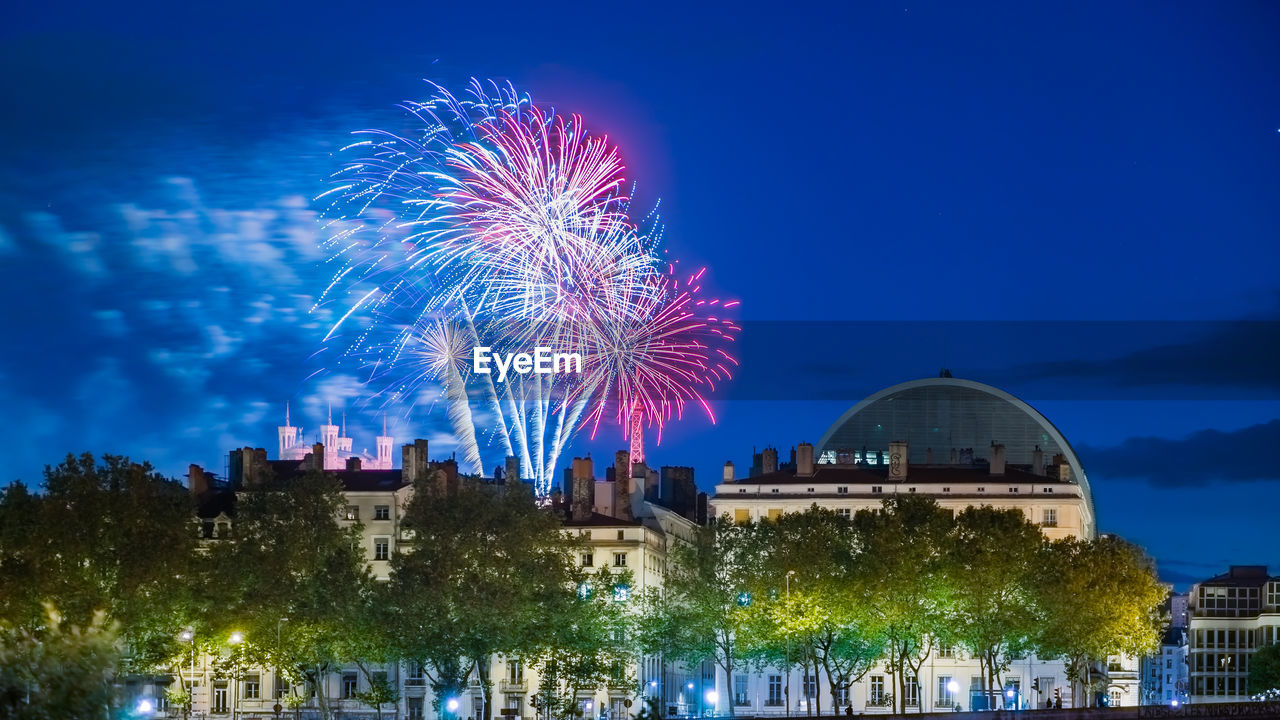 Low angle view of firework display during bastille day celebration