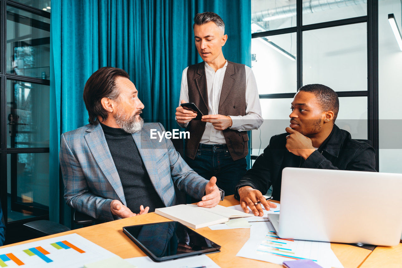 business colleagues working on table