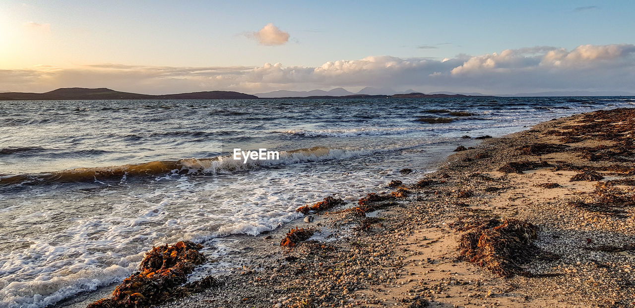 VIEW OF BEACH AGAINST SKY