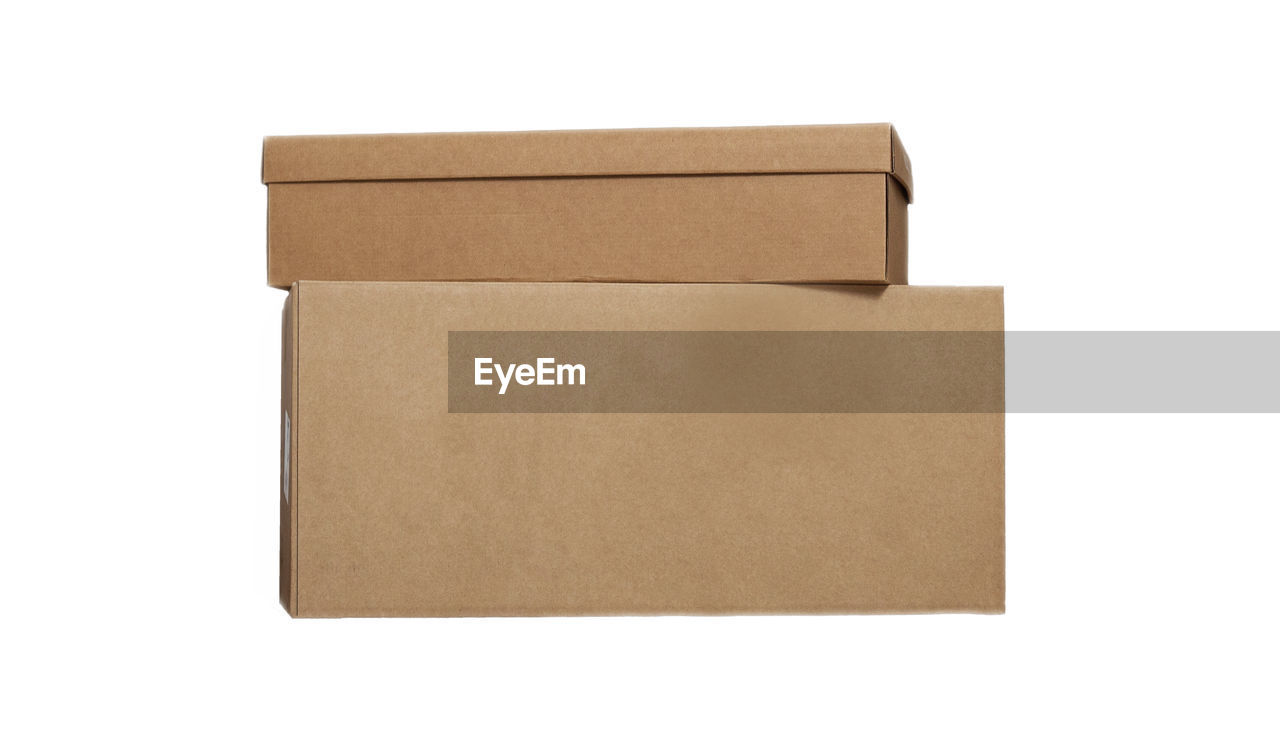 brown, paper, box, cut out, package, cardboard, white background, container, copy space, brown paper, letter, mail, packing, freight transportation, cardboard box, rectangle, delivering, shipping, single object, no people, business, wood, empty, indoors, envelope, document, sending, gift, studio shot, white, wrapping paper, man made object