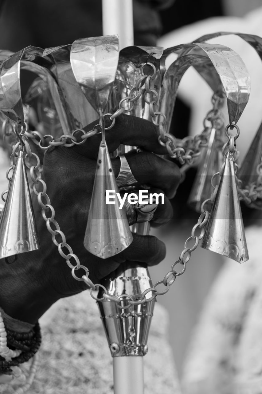 black, black and white, focus on foreground, monochrome, monochrome photography, hanging, white, fashion accessory, no people, halter, horse, metal, close-up, bridle, chain