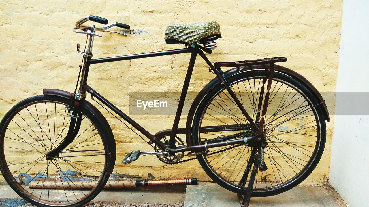 BICYCLES PARKED ON BICYCLE