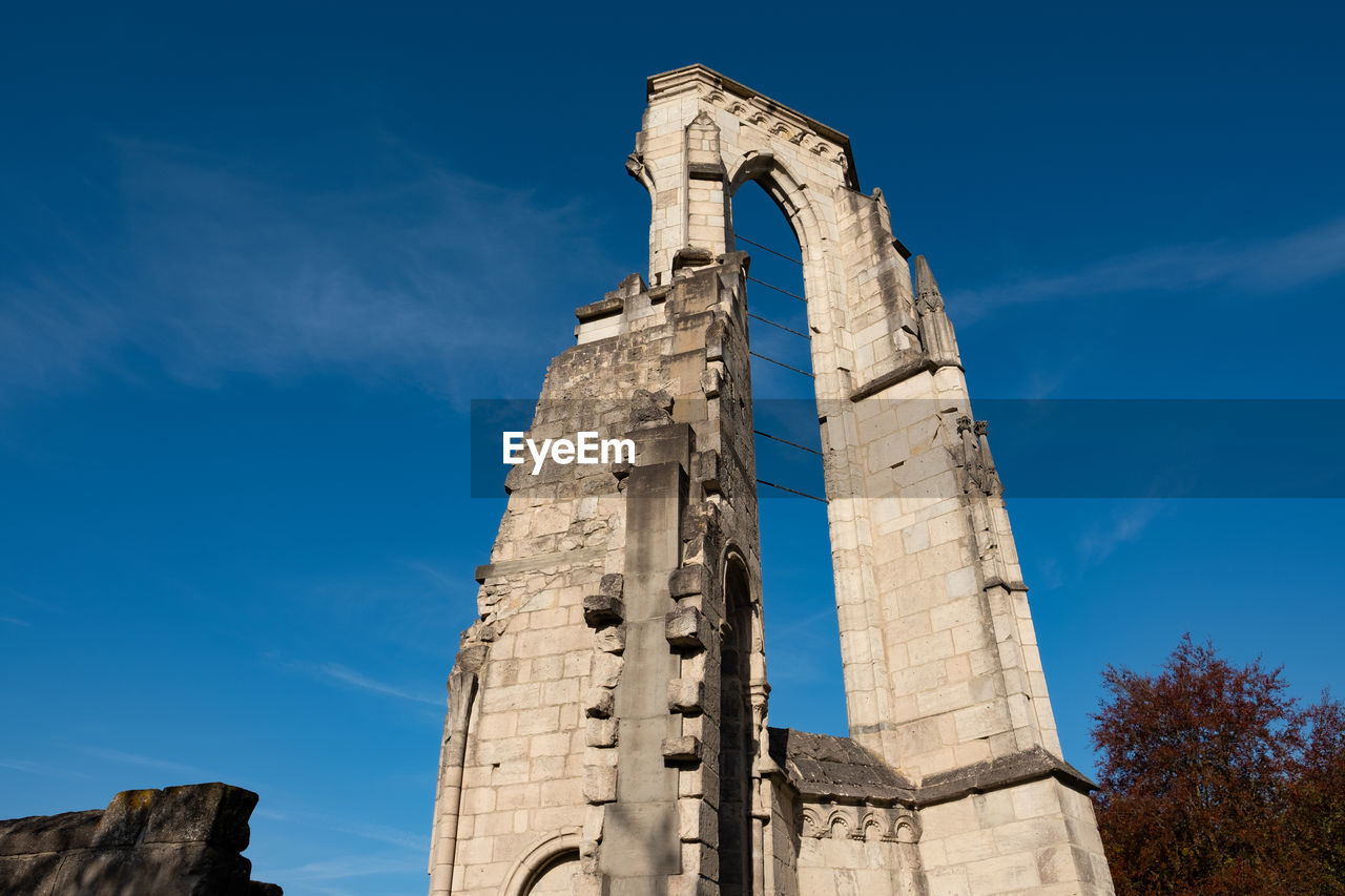 landmark, architecture, history, the past, sky, travel destinations, built structure, blue, nature, tower, travel, old ruin, ancient, low angle view, ruins, rock, monument, no people, religion, building exterior, tourism, outdoors, city, old, day, stone material, ancient civilization, temple - building, ruined, building, belief, memorial, clear sky, cloud, archaeology, place of worship