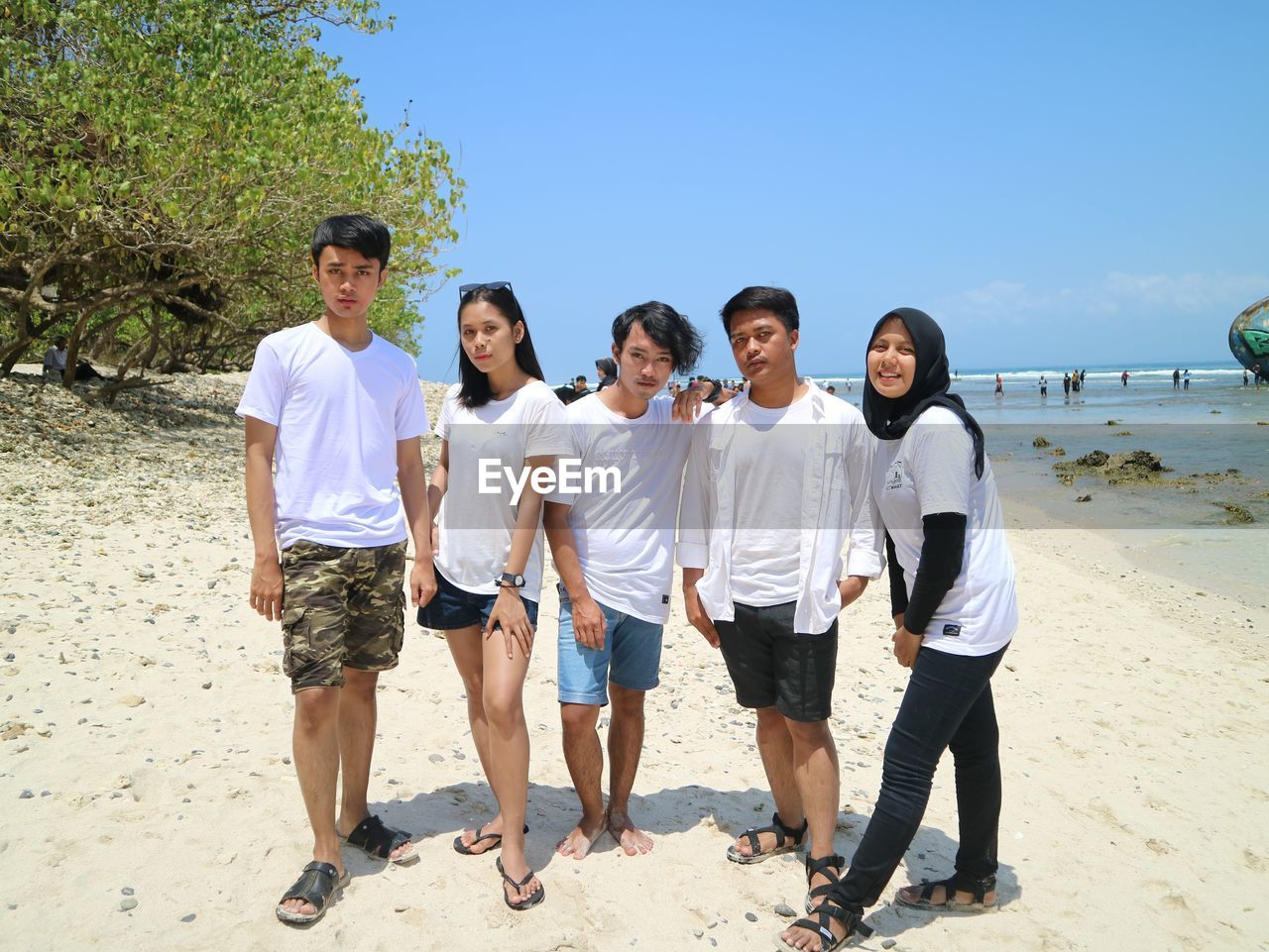 People standing on beach