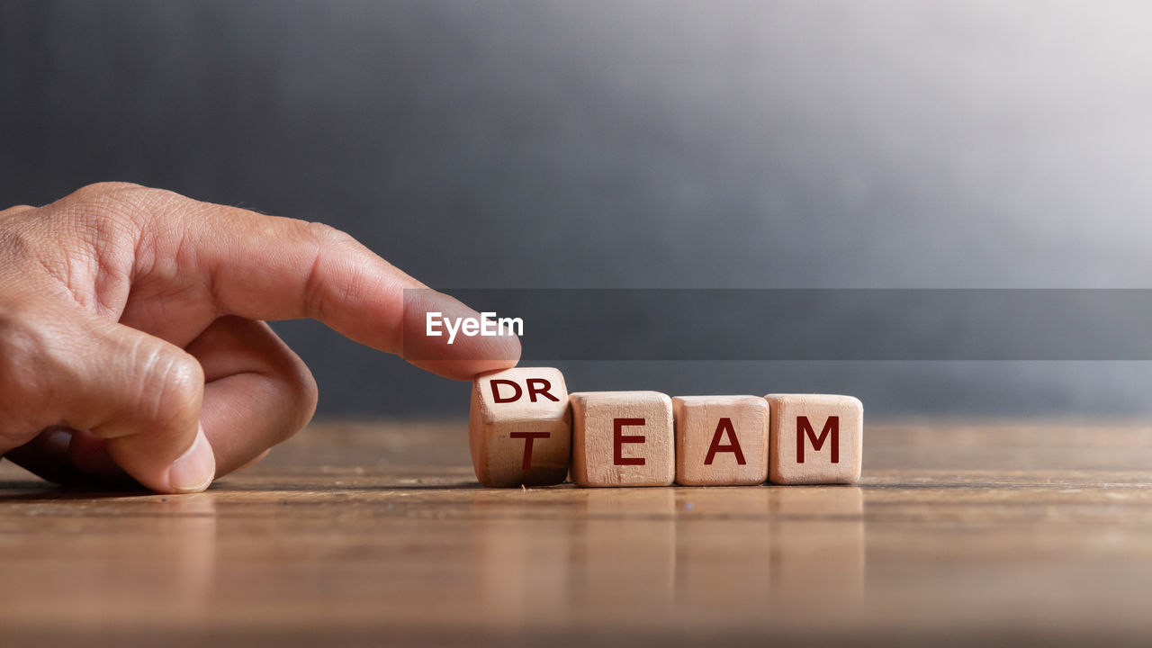 Dream team word in wood dice