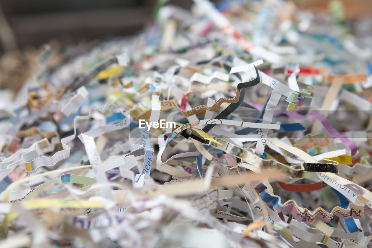 Selective focus pile of recycled paper scraps for global warming concept