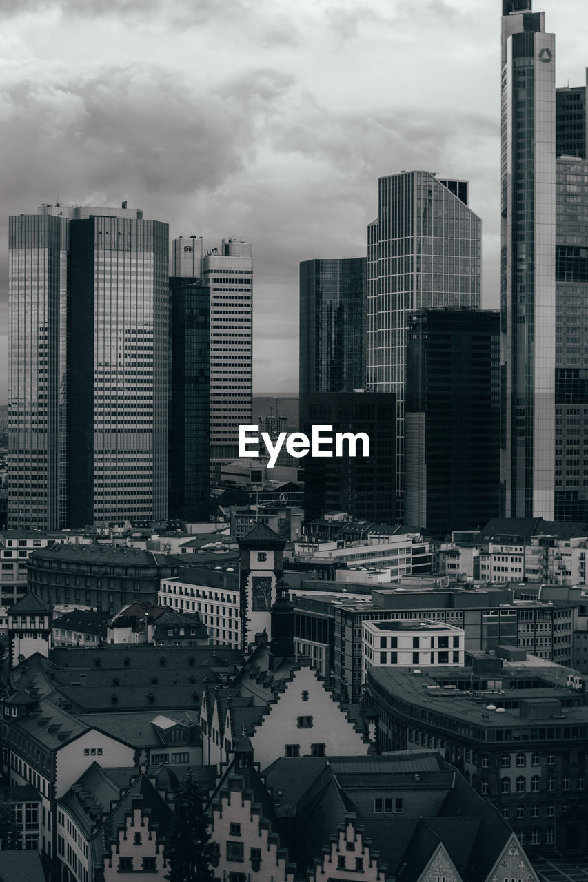 Modern buildings in city against sky