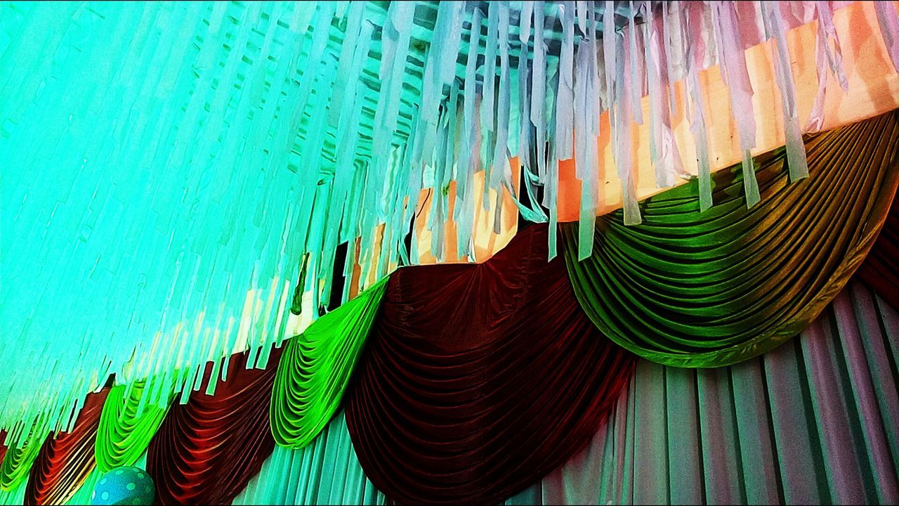 Low angle view of patterned decorations in tent