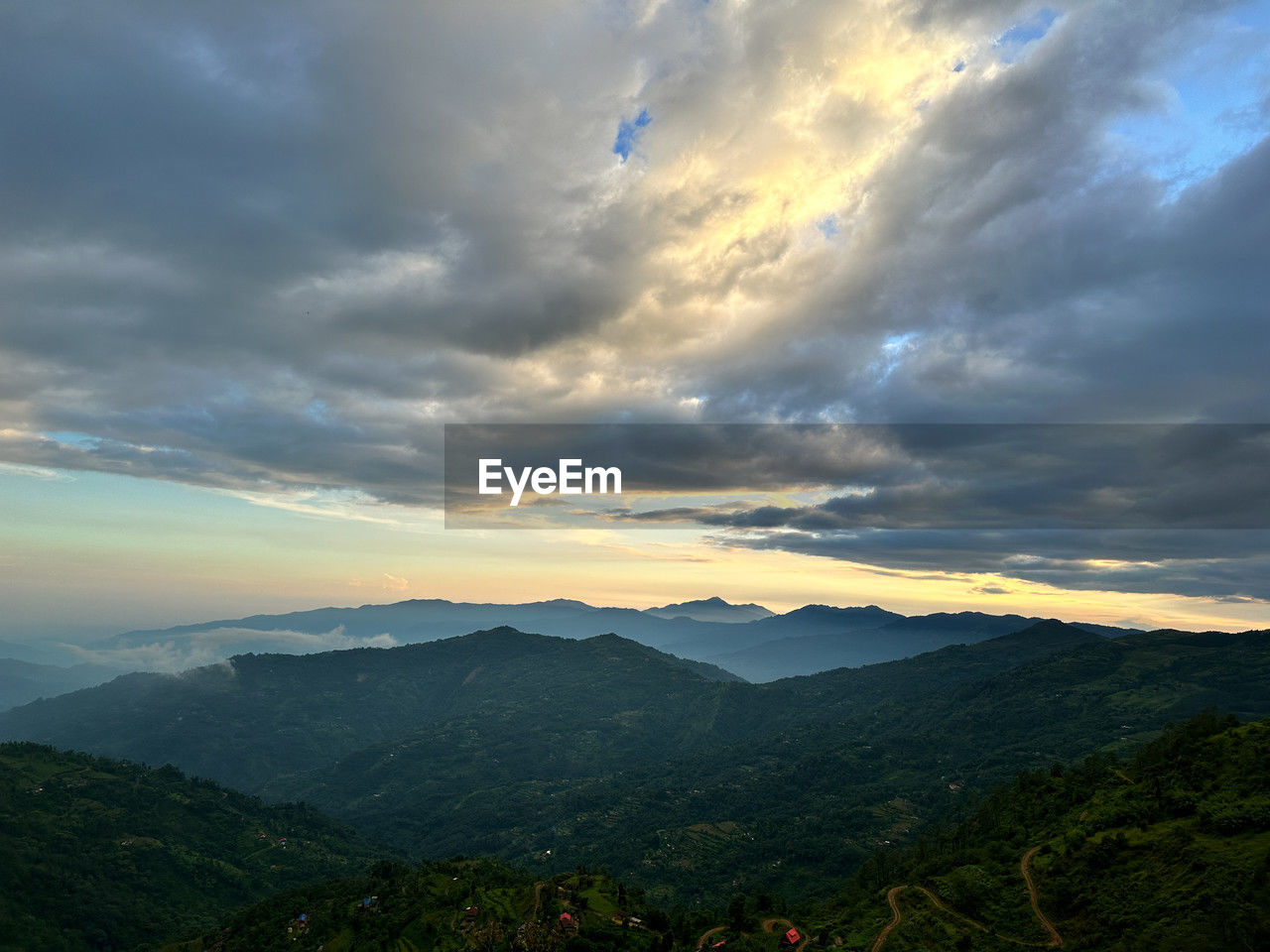 environment, cloud, sky, mountain, scenics - nature, landscape, nature, beauty in nature, mountain range, land, dramatic sky, sunset, tranquility, sunlight, forest, travel, sun, tranquil scene, tree, plant, valley, cloudscape, outdoors, no people, travel destinations, fog, horizon, sunbeam, non-urban scene, rural scene, idyllic, tourism, summer, dawn, twilight, mountain peak, horizon over land, overcast, awe, social issues, atmospheric mood, environmental conservation, high angle view, field, blue, multi colored, high up, activity, trip