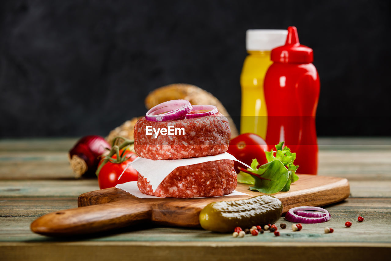 Close-up of meat on cutting board