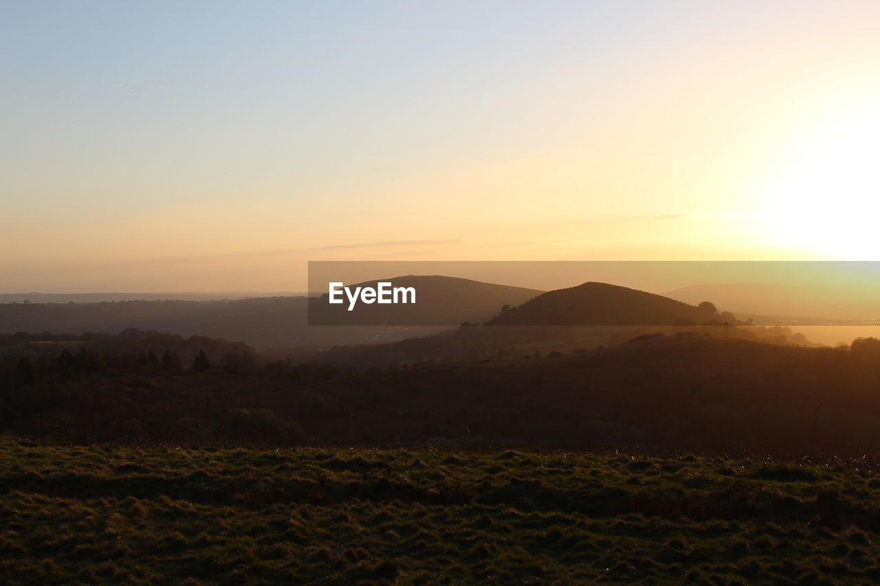 SCENIC VIEW OF LANDSCAPE DURING SUNSET